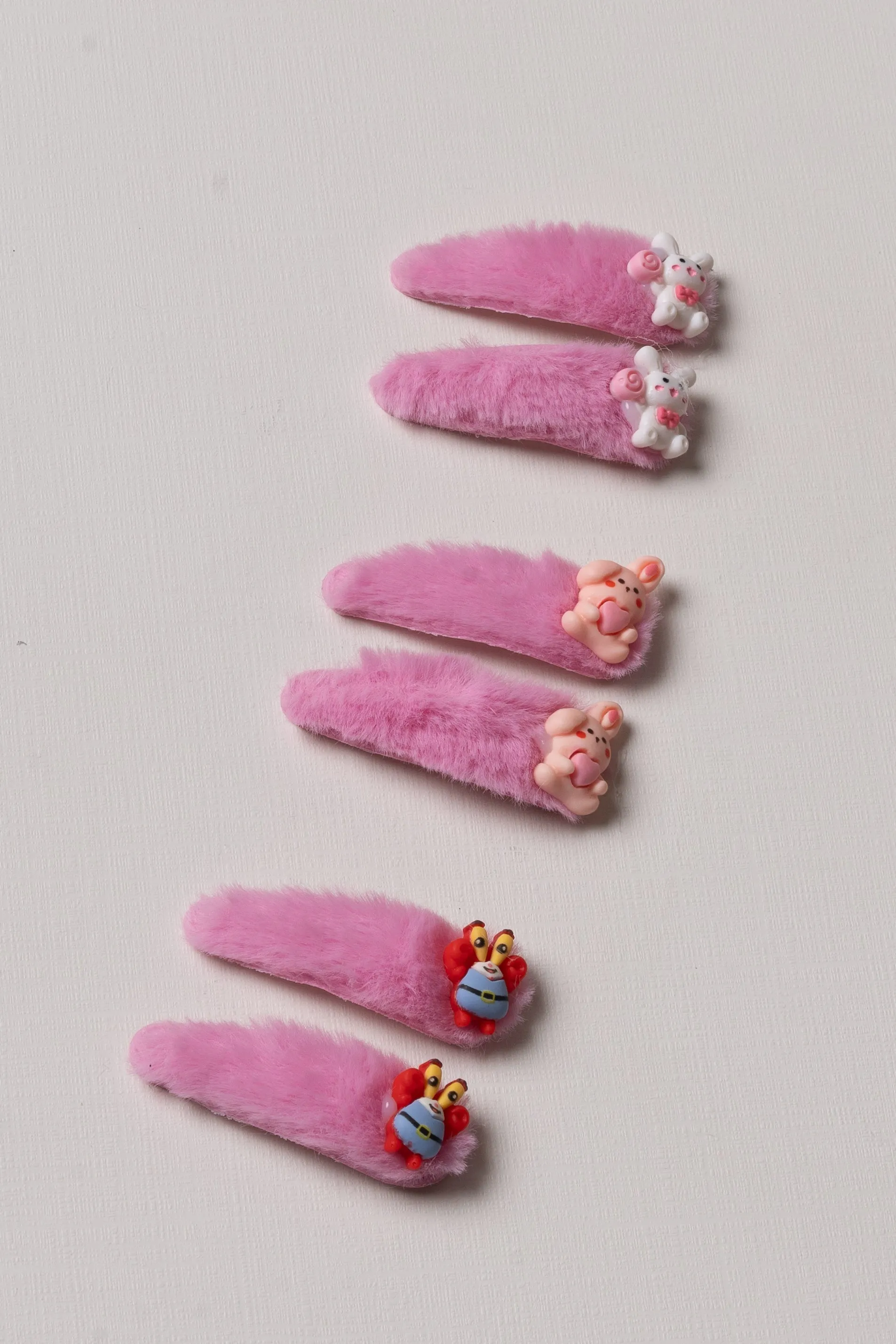 Vibrant Pink Character Fuzzy Tick Tac Clips