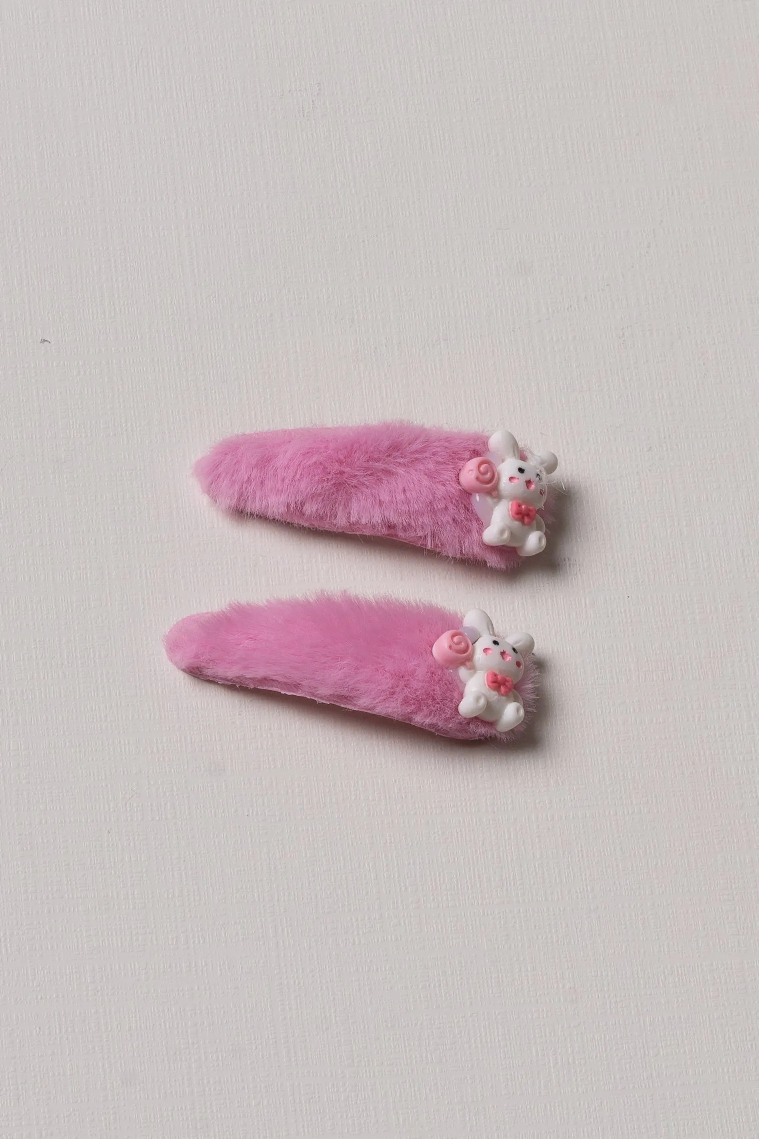Vibrant Pink Character Fuzzy Tick Tac Clips